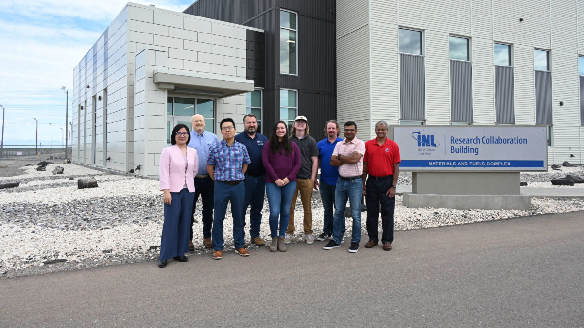 group of people standing in front of building